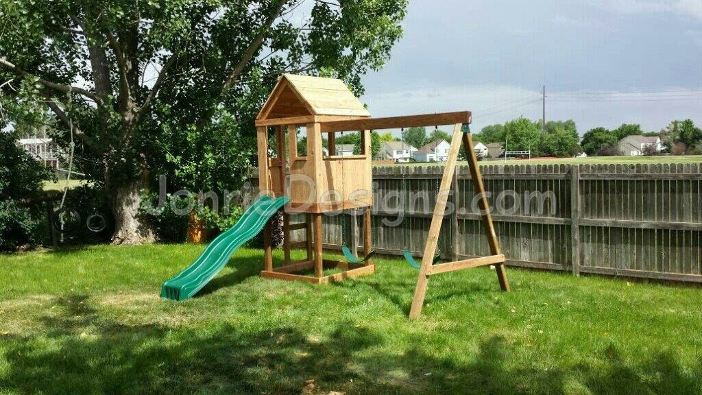 4'x4' Clubhouse with wooden roof, 4' Deck Height, Standard slide, Ladder entry, 8' Swing beam with 2 Standard swings