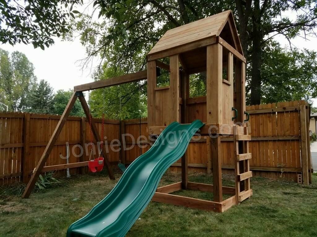 4'x4' Clubhouse with wooden roof, 4' Deck height, Standard slide, Ladder entry, 8' Swing beam with 1 Standard swing & 1 Red Bucket Swing