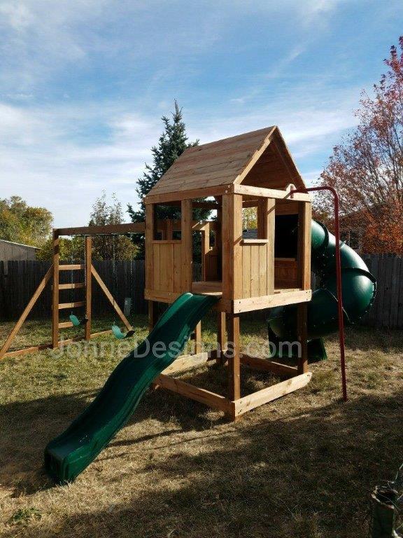 5'x5' Clubhouse with wooden roof, 4' Deck height, Standard slide, 5' Enclosed spiral slide, Fireman pole, 12' Monkey bars with dual ladders & 2 Standard swings