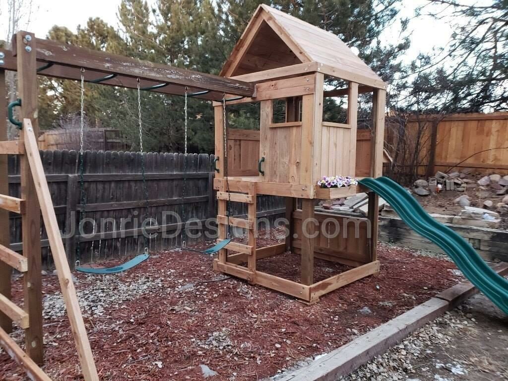 5'x5' Clubhouse with wooden roof, 4' Deck height, Lemonade stand, 4' Standard slide, 8' Monkey bars with dual ladders, 2 Standard swings & Flower Planter