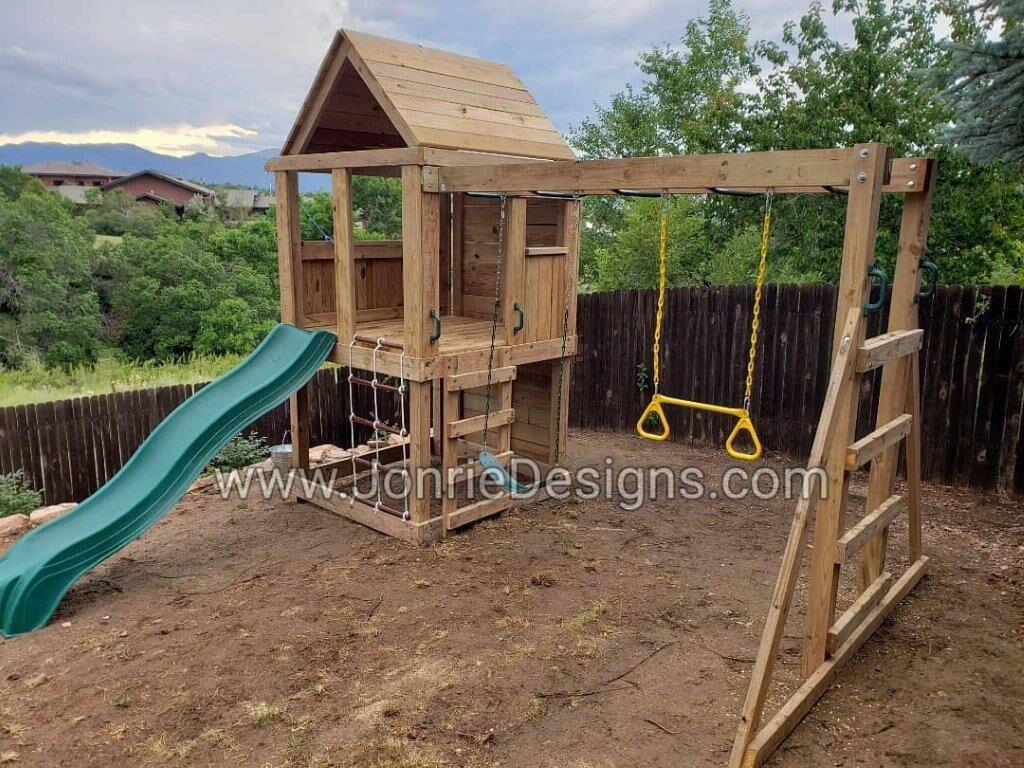 5'x5' Clubhouse with wooden roof, 4' Deck height, 4' Upgraded slide, 2' Cargo net entry, 8' Climbing wall (non-entry), Drop down bucket, 8' Monkey bars with dual ladders, Standard swing & trapeze bar.