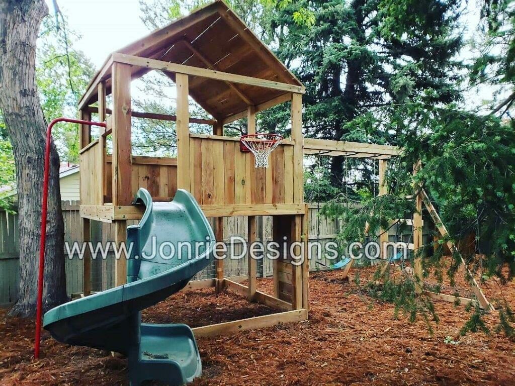 8'x8' Clubhouse with wooden roof, 5' deck height, Fireman pole, 8' Monkey bars with ladders & rock wall entries, Basketball hoop, 5' Open Spiral Slide